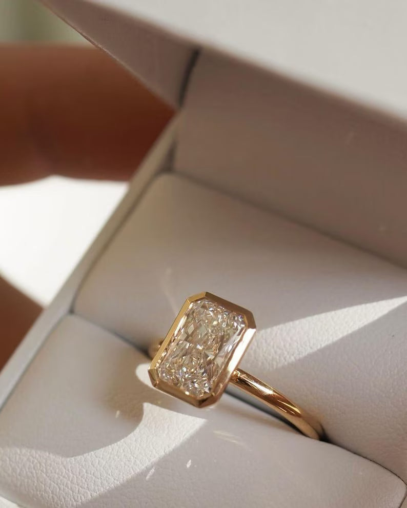 Elongated Radiant Cut Bezel Set Moissanite Solitaire Engagement Ring