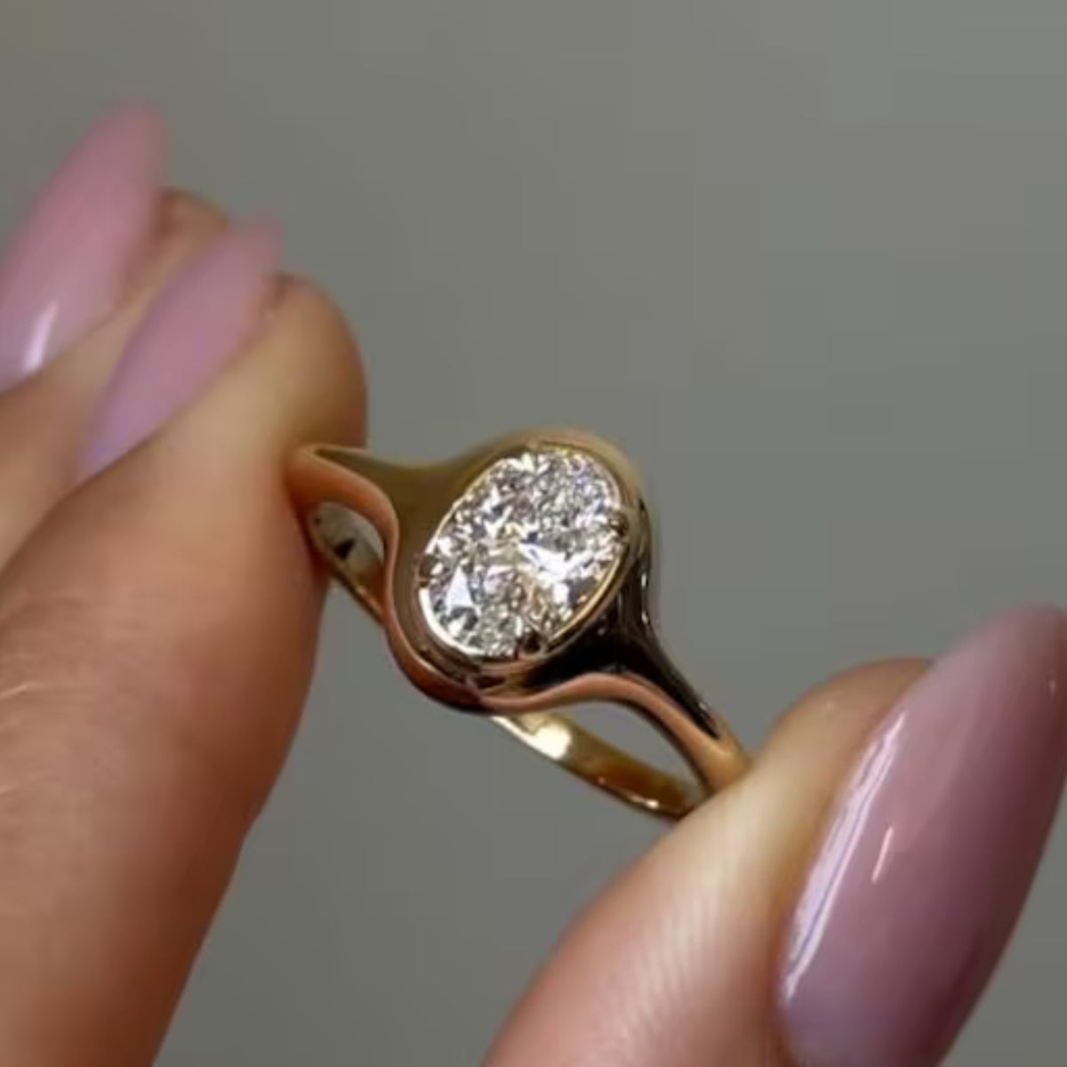 0.75 Ct Oval Moissanite Bezel Set Solitaire Ring in 14K Gold