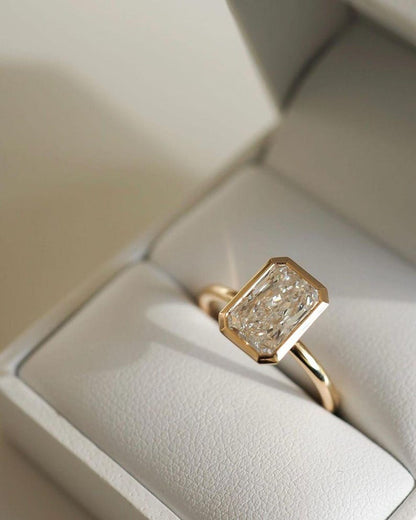 Elongated Radiant Cut Bezel Set Moissanite Solitaire Engagement Ring