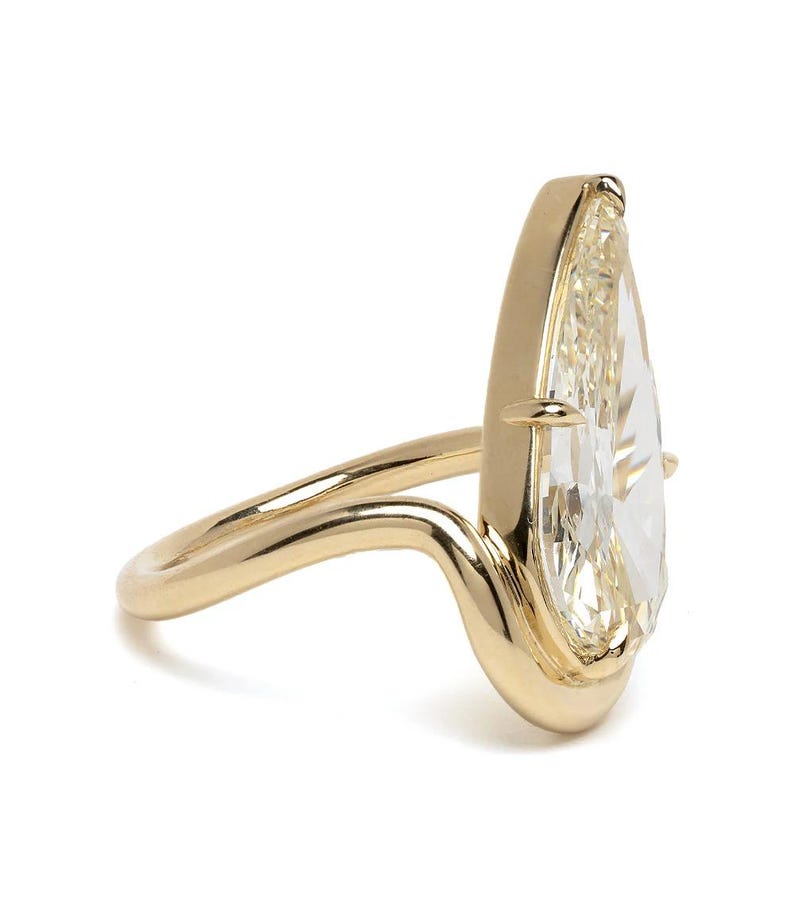 Modern Pear Cut Diamond Engagement Ring - Floating Half-Bezel Curved Band