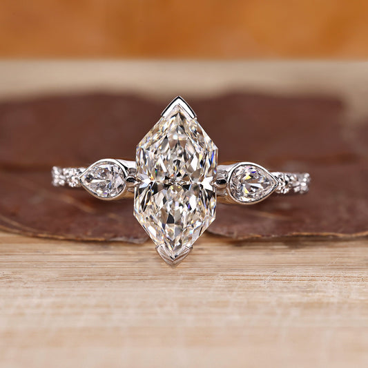Dutch Marquise and Pear Cut Three Stone Diamond Ring