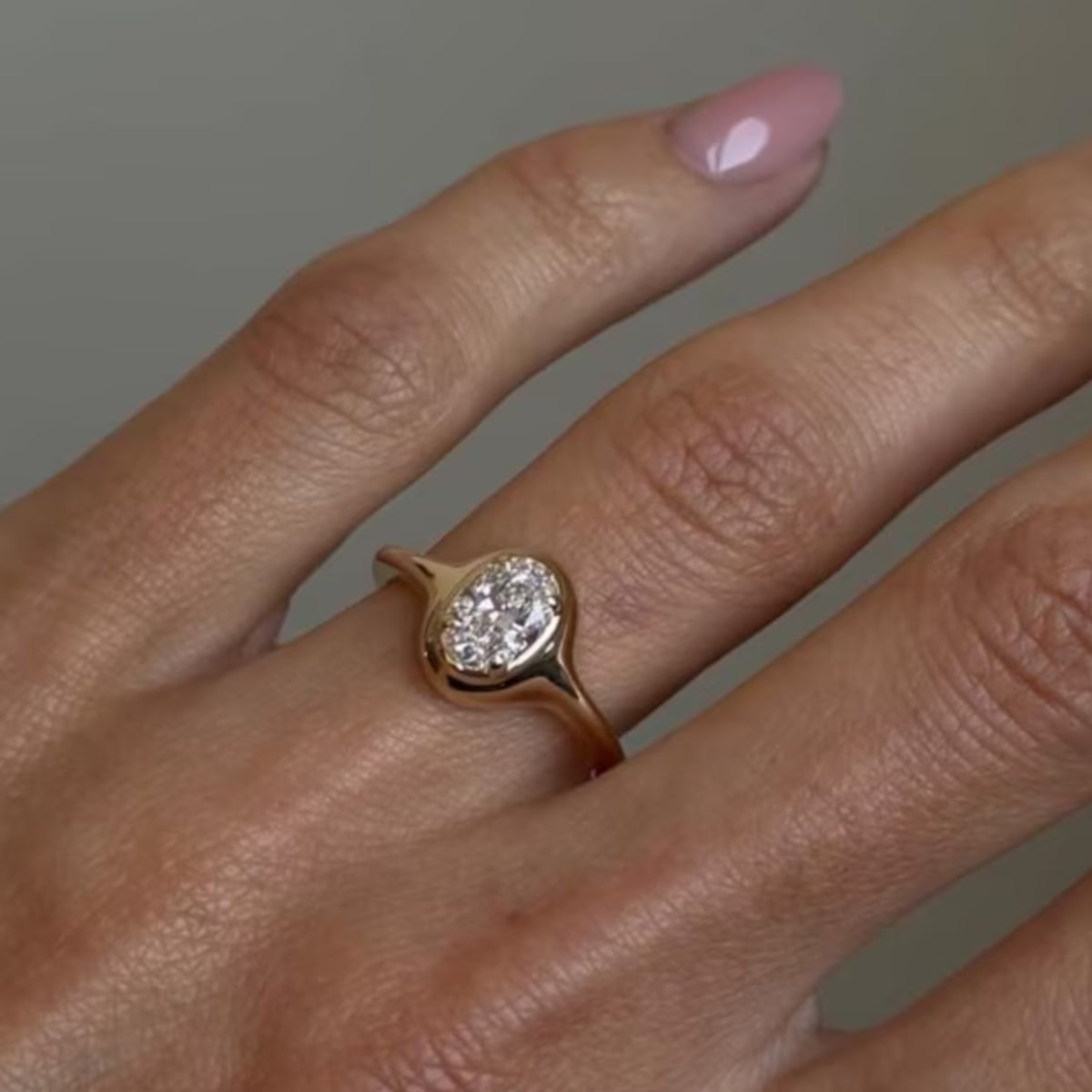 0.75 Ct Oval Moissanite Bezel Set Solitaire Ring in 14K Gold
