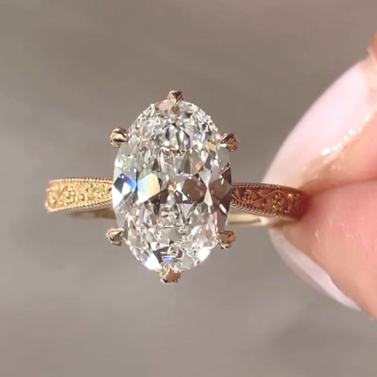 Vintage Oval Cut Moissanite Engagement Ring with Filigree Engraved Band