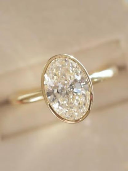 Bezel Set Oval Cut Moissanite Solitaire Ring - Sleek Minimalist Gold Engagement Ring