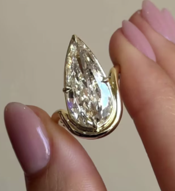 Modern Pear Cut Diamond Engagement Ring - Floating Half-Bezel Curved Band