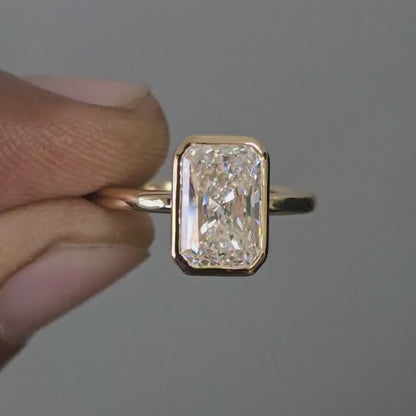 Elongated Radiant Cut Bezel Set Moissanite Solitaire Engagement Ring